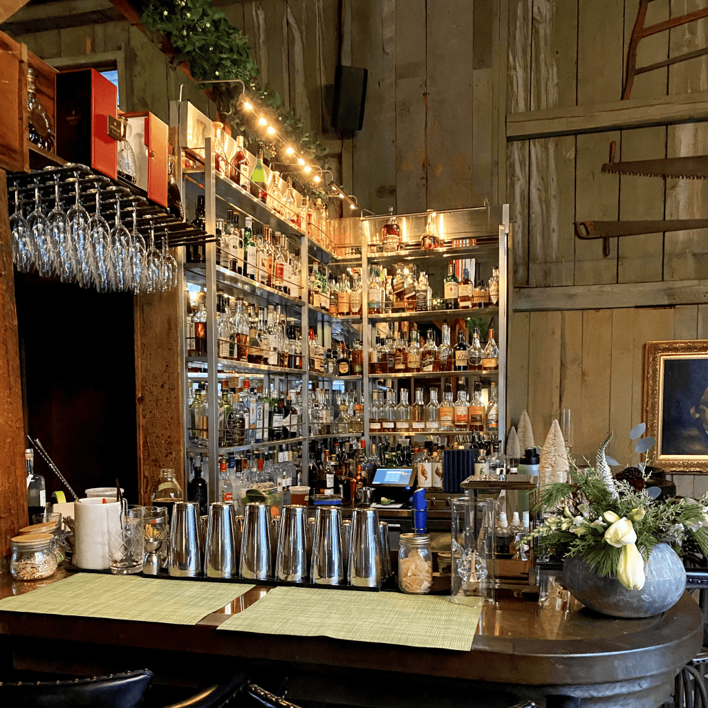White Barn Inn bar fully stocked with spirits
